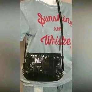 Leather of The Sea small eel skin crossbody bag.